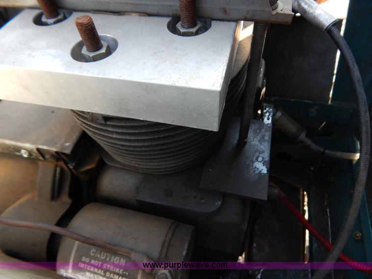 image for item AW9203 Cub Cadet pulling lawn tractor