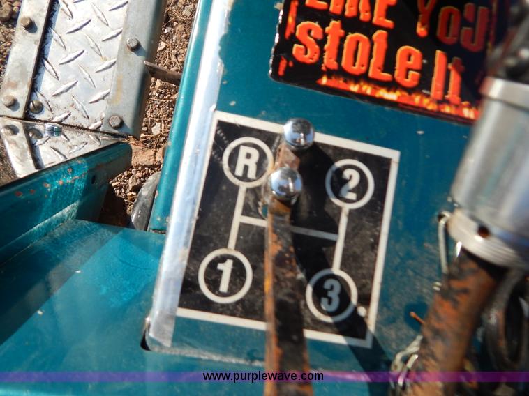 image for item AW9203 Cub Cadet pulling lawn tractor