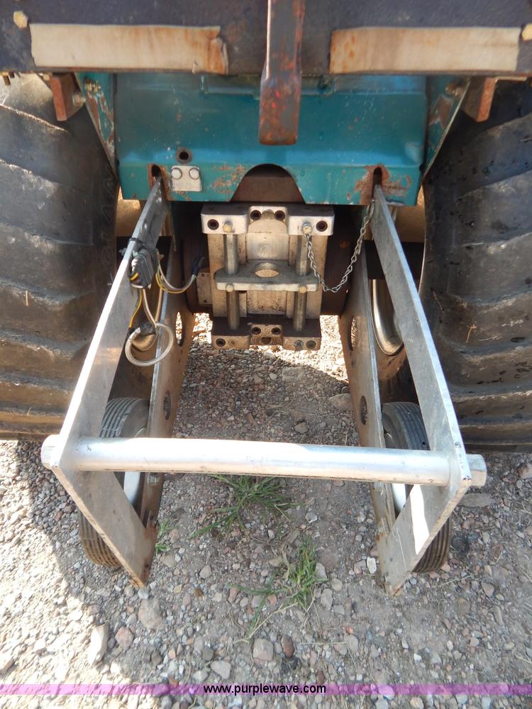 image for item AW9203 Cub Cadet pulling lawn tractor