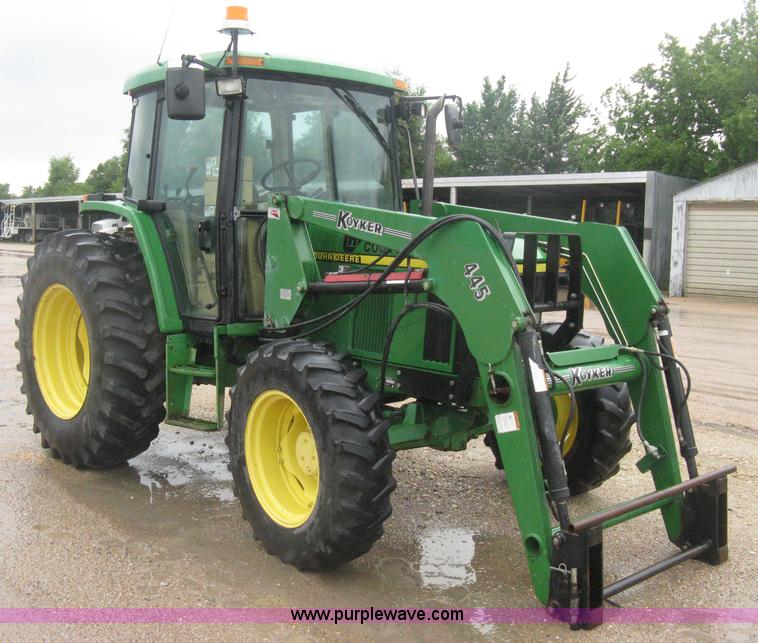 image for item D8490 2002 John Deere 6405 MFWD tractor
