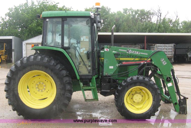 image for item D8490 2002 John Deere 6405 MFWD tractor