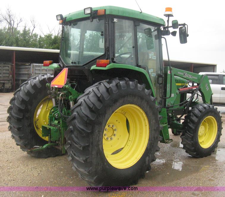 image for item D8490 2002 John Deere 6405 MFWD tractor