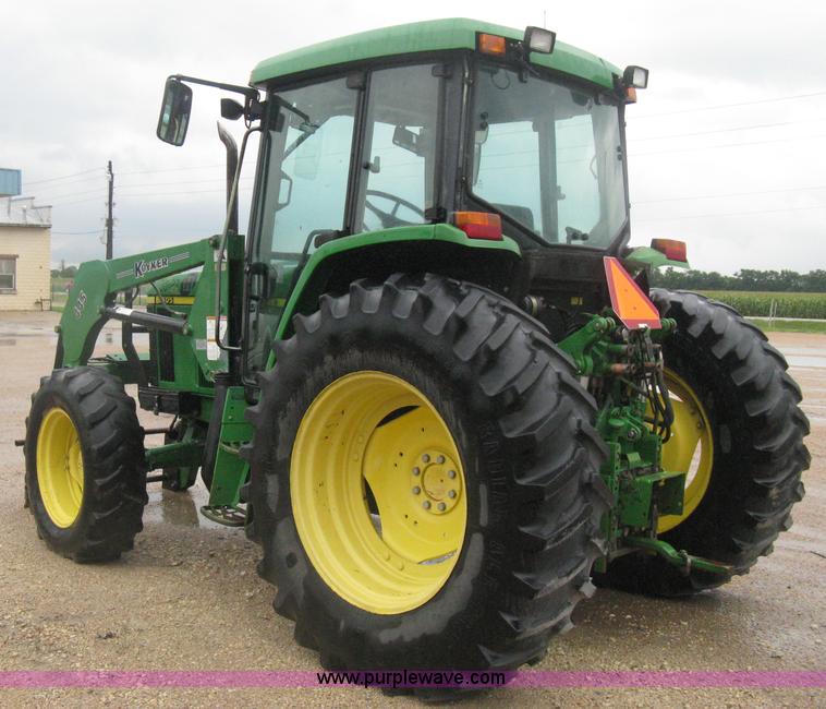 image for item D8490 2002 John Deere 6405 MFWD tractor