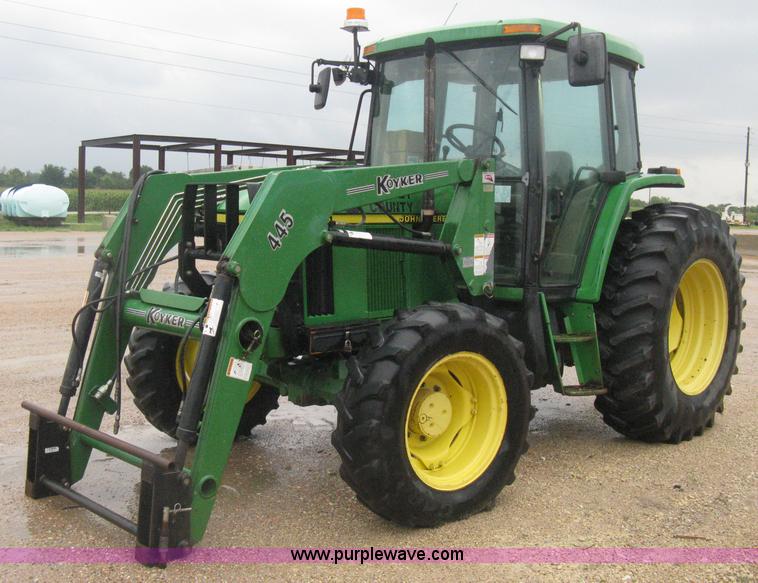 image for item D8490 2002 John Deere 6405 MFWD tractor