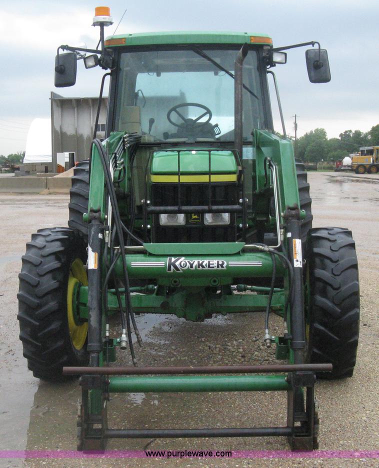 image for item D8490 2002 John Deere 6405 MFWD tractor