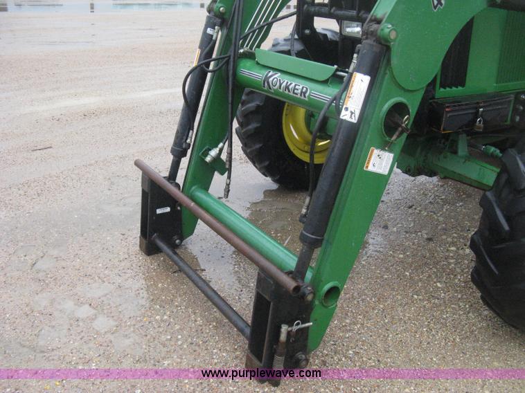 image for item D8490 2002 John Deere 6405 MFWD tractor