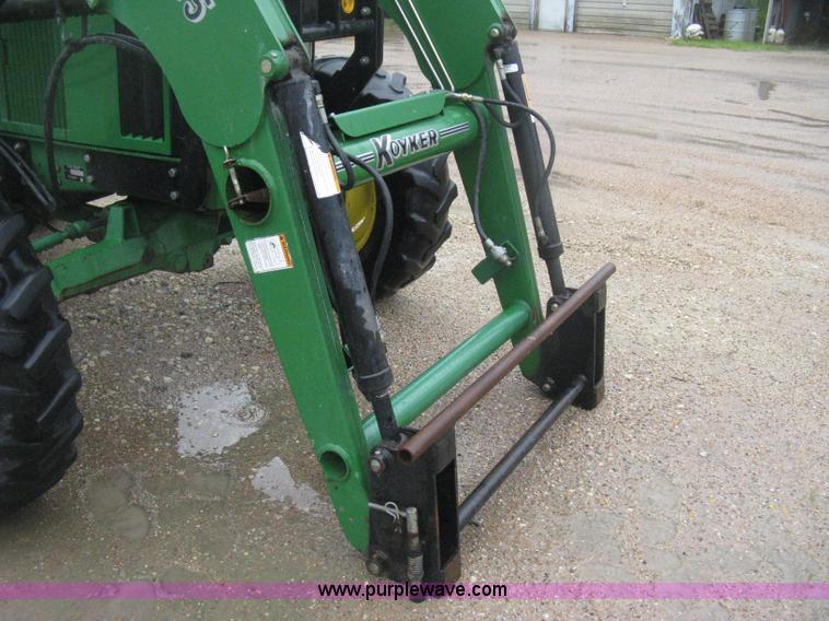 image for item D8490 2002 John Deere 6405 MFWD tractor