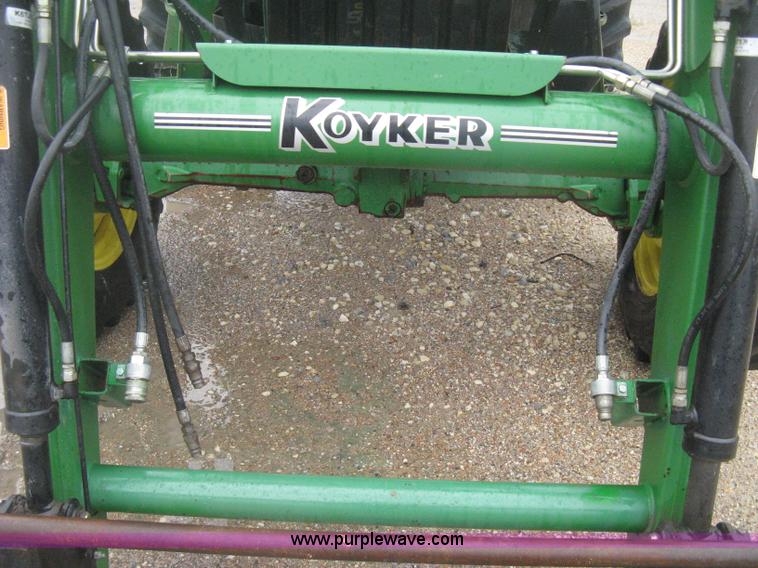 image for item D8490 2002 John Deere 6405 MFWD tractor