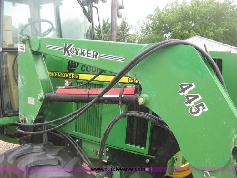 image for item D8490 2002 John Deere 6405 MFWD tractor