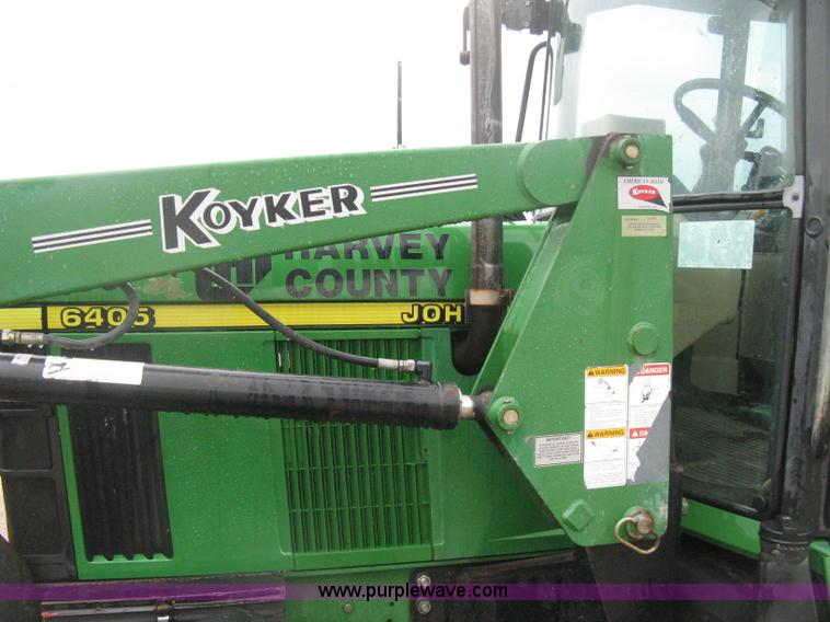 image for item D8490 2002 John Deere 6405 MFWD tractor