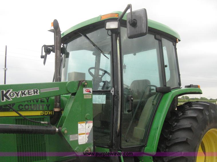 image for item D8490 2002 John Deere 6405 MFWD tractor