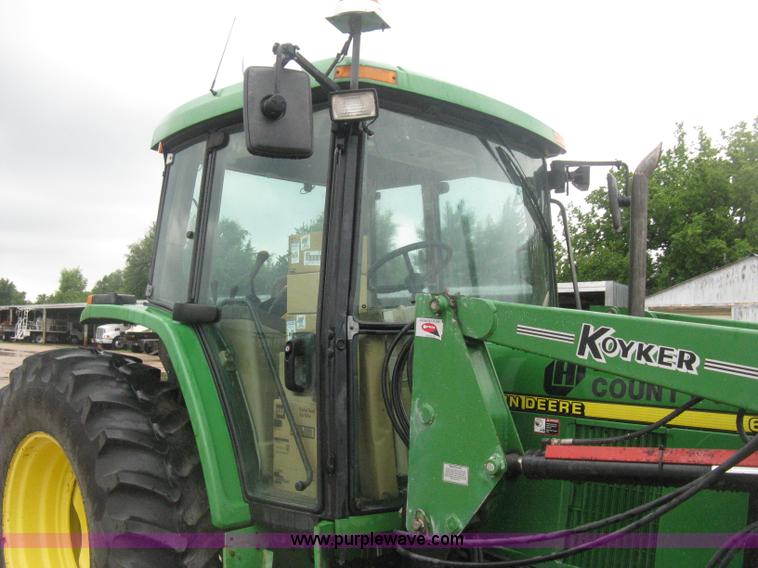 image for item D8490 2002 John Deere 6405 MFWD tractor