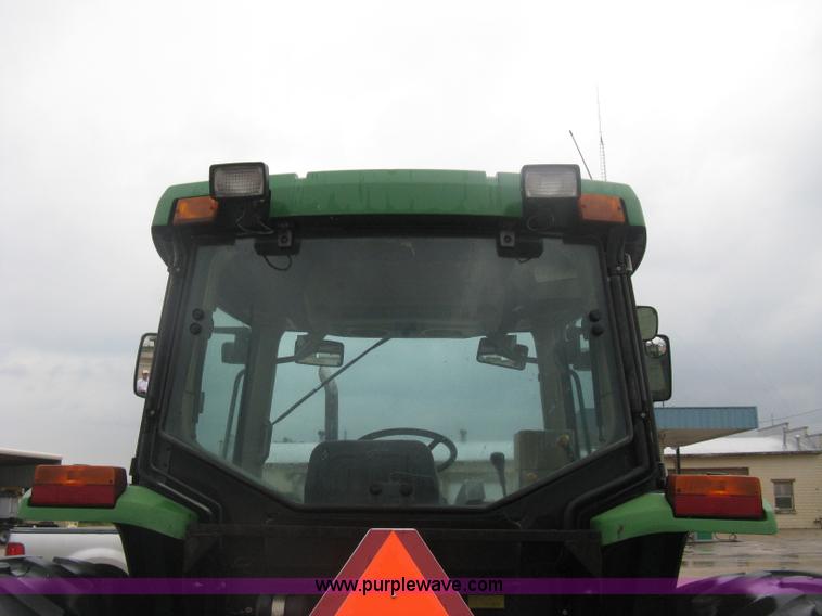image for item D8490 2002 John Deere 6405 MFWD tractor