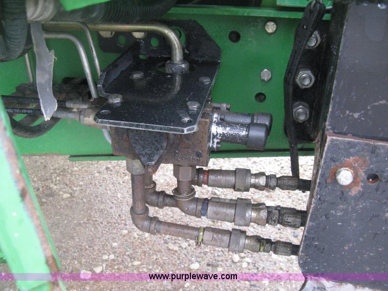 image for item D8490 2002 John Deere 6405 MFWD tractor