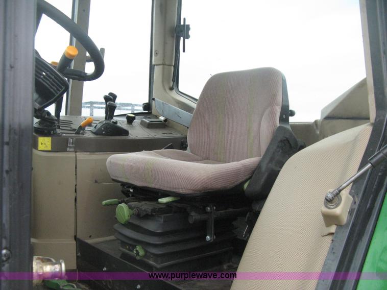 image for item D8490 2002 John Deere 6405 MFWD tractor