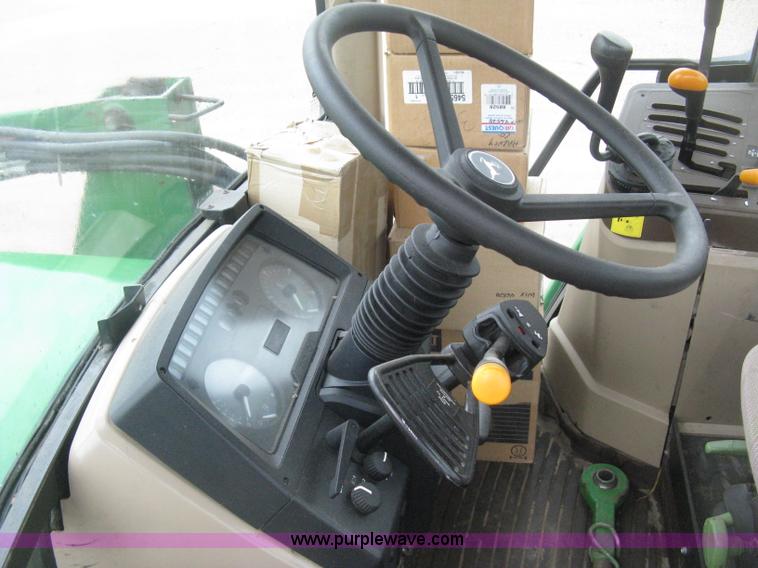 image for item D8490 2002 John Deere 6405 MFWD tractor