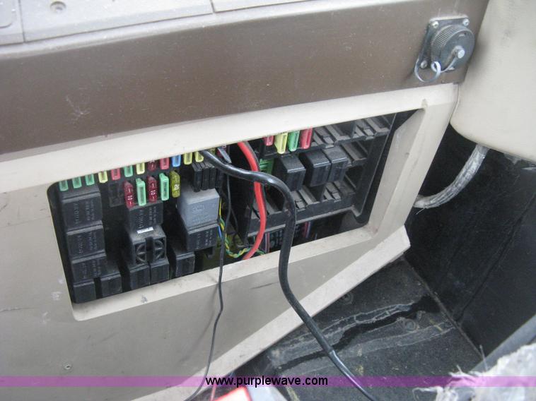 image for item D8490 2002 John Deere 6405 MFWD tractor