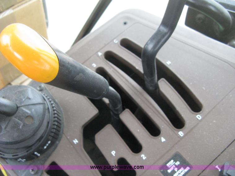 image for item D8490 2002 John Deere 6405 MFWD tractor