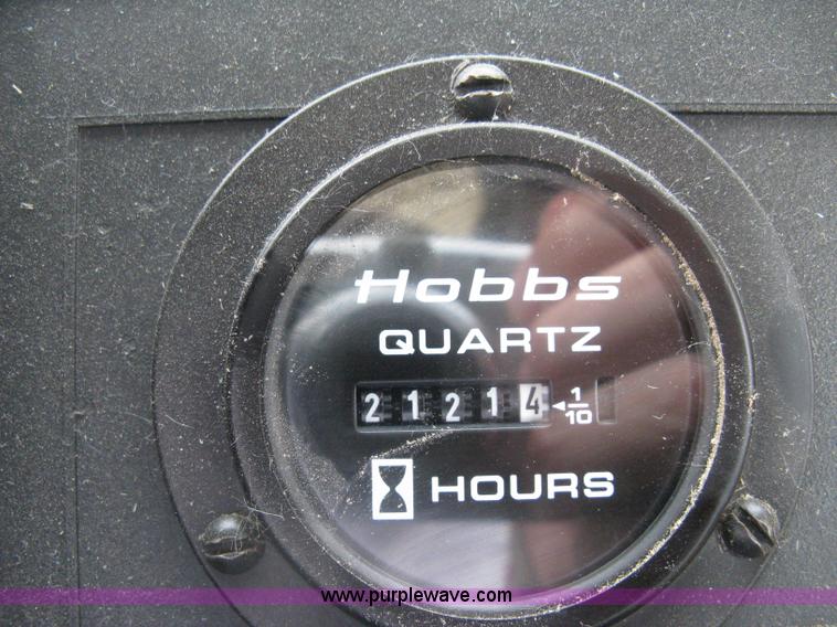 image for item D8490 2002 John Deere 6405 MFWD tractor