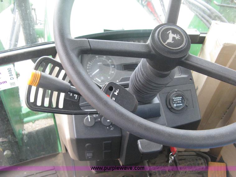 image for item D8490 2002 John Deere 6405 MFWD tractor