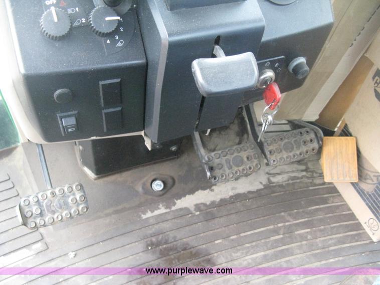 image for item D8490 2002 John Deere 6405 MFWD tractor