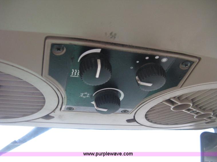 image for item D8490 2002 John Deere 6405 MFWD tractor