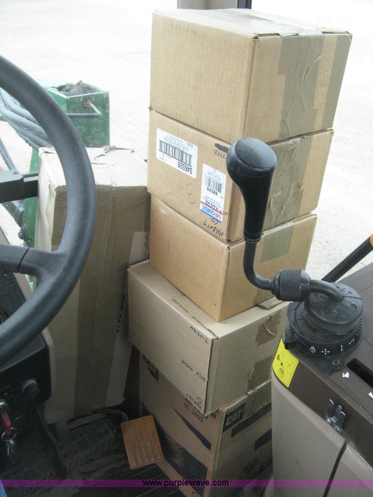 image for item D8490 2002 John Deere 6405 MFWD tractor