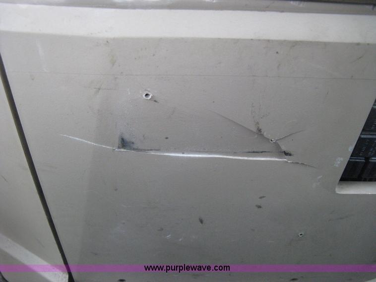 image for item D8490 2002 John Deere 6405 MFWD tractor