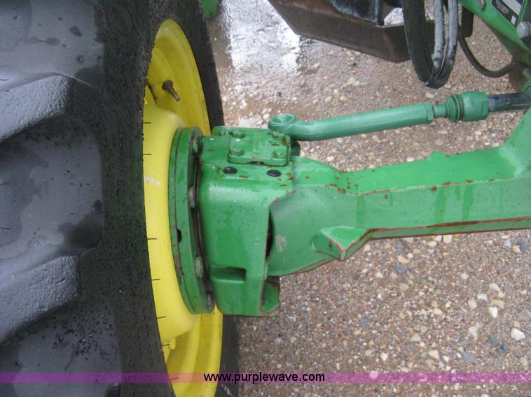 image for item D8490 2002 John Deere 6405 MFWD tractor