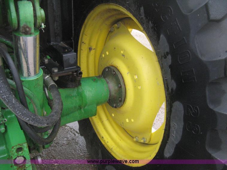 image for item D8490 2002 John Deere 6405 MFWD tractor