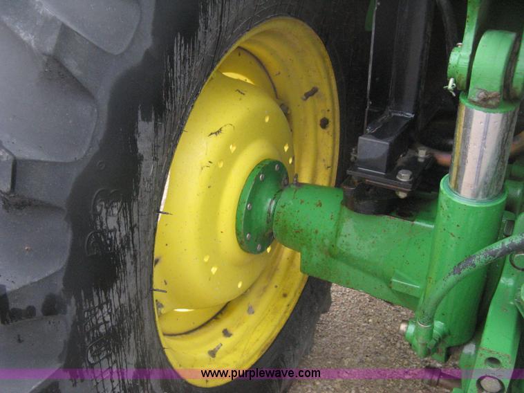 image for item D8490 2002 John Deere 6405 MFWD tractor