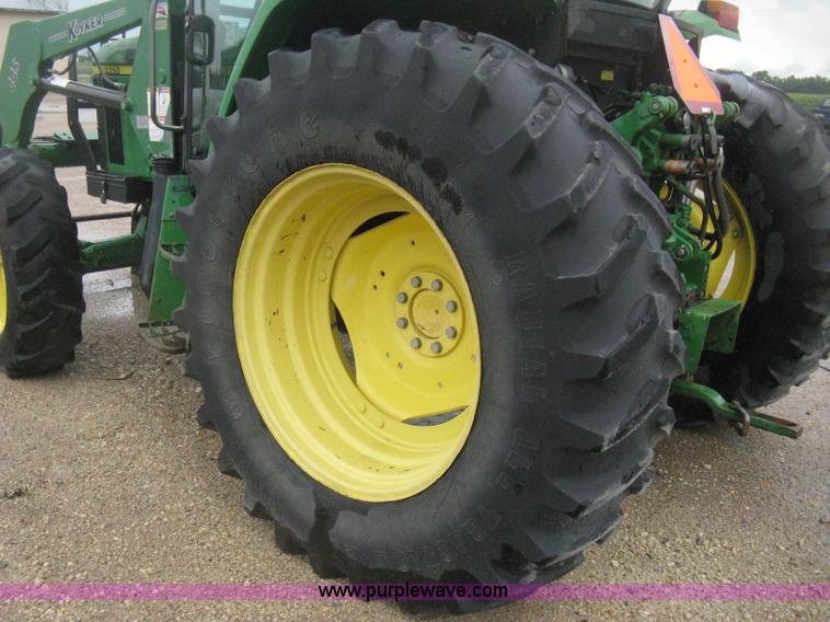 image for item D8490 2002 John Deere 6405 MFWD tractor