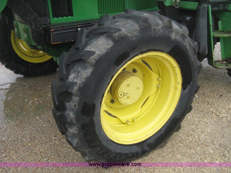 image for item D8490 2002 John Deere 6405 MFWD tractor