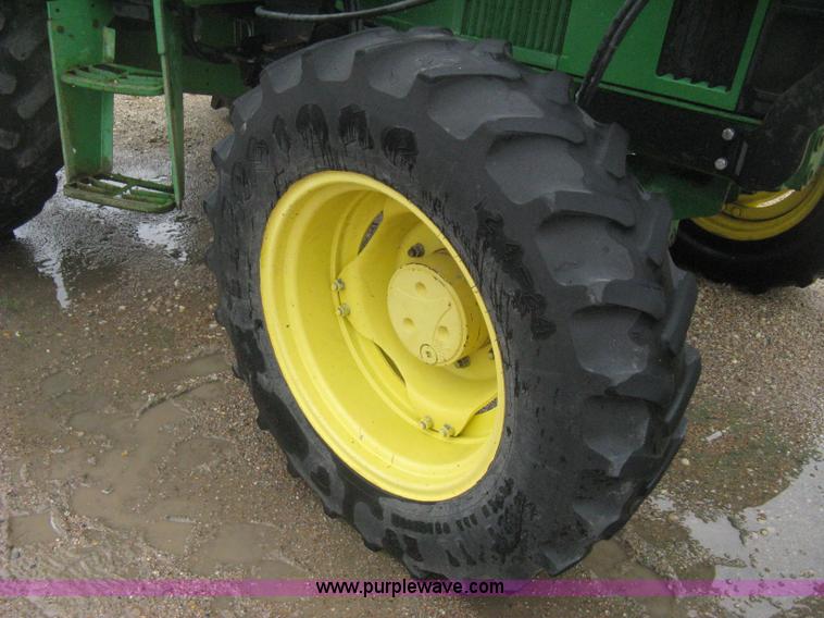 image for item D8490 2002 John Deere 6405 MFWD tractor