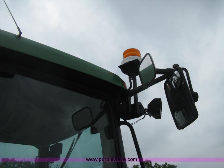 image for item D8490 2002 John Deere 6405 MFWD tractor