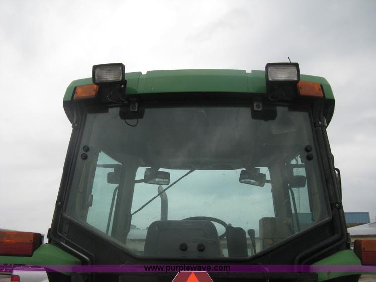 image for item D8490 2002 John Deere 6405 MFWD tractor