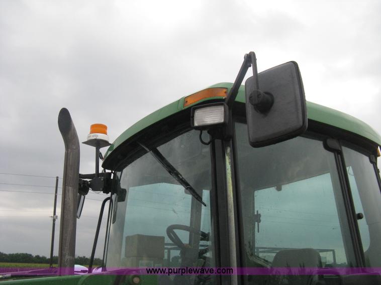 image for item D8490 2002 John Deere 6405 MFWD tractor