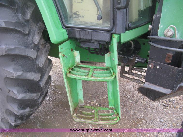image for item D8490 2002 John Deere 6405 MFWD tractor