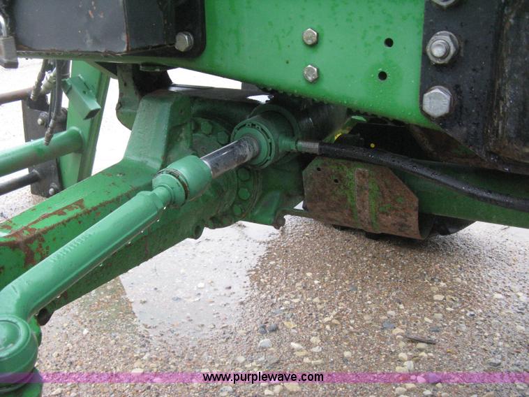 image for item D8490 2002 John Deere 6405 MFWD tractor
