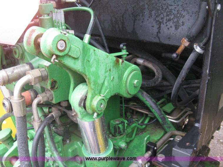 image for item D8490 2002 John Deere 6405 MFWD tractor