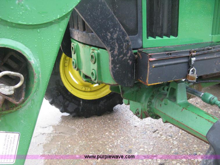 image for item D8490 2002 John Deere 6405 MFWD tractor