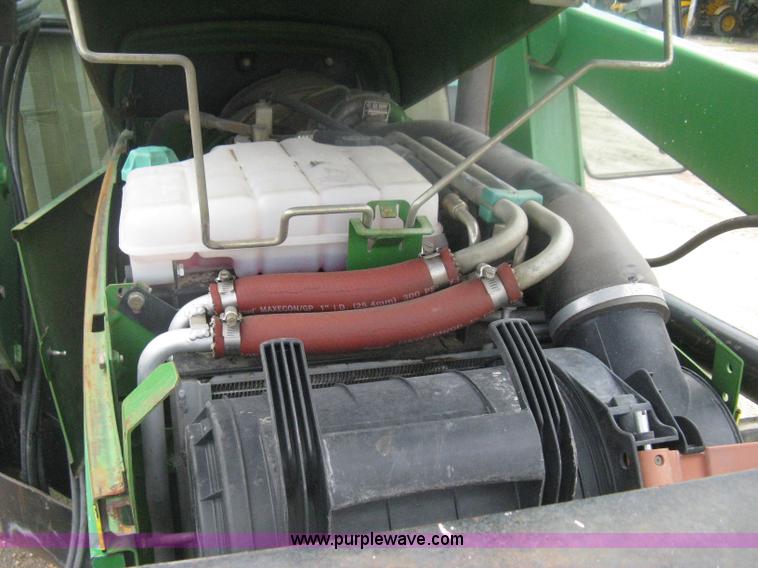 image for item D8490 2002 John Deere 6405 MFWD tractor