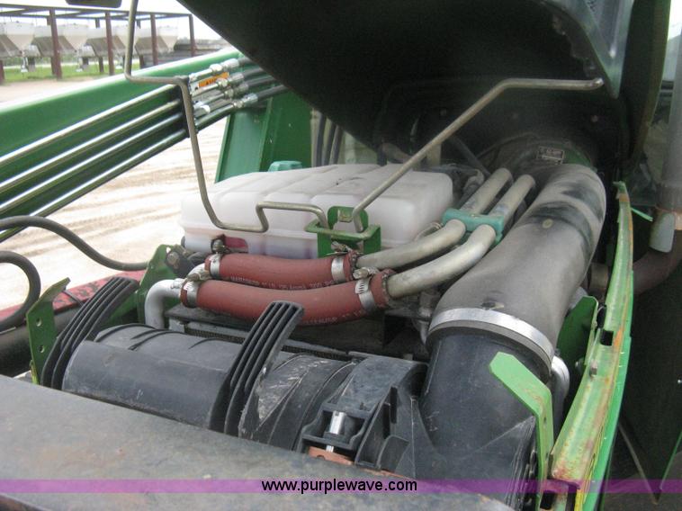 image for item D8490 2002 John Deere 6405 MFWD tractor