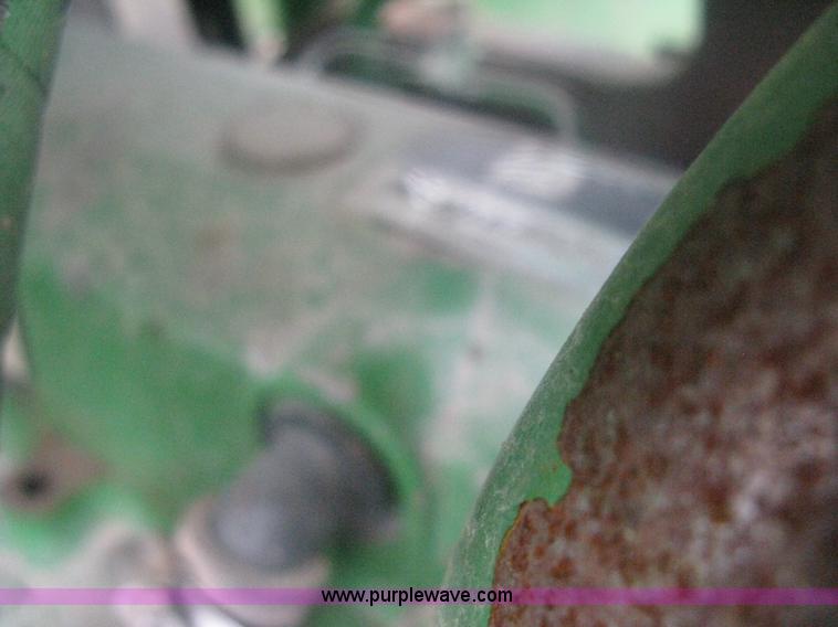 image for item D8490 2002 John Deere 6405 MFWD tractor