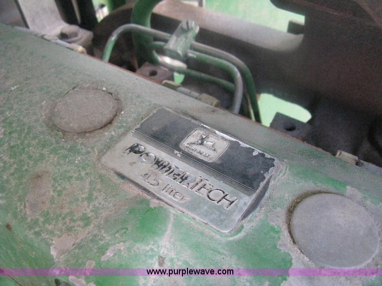 image for item D8490 2002 John Deere 6405 MFWD tractor