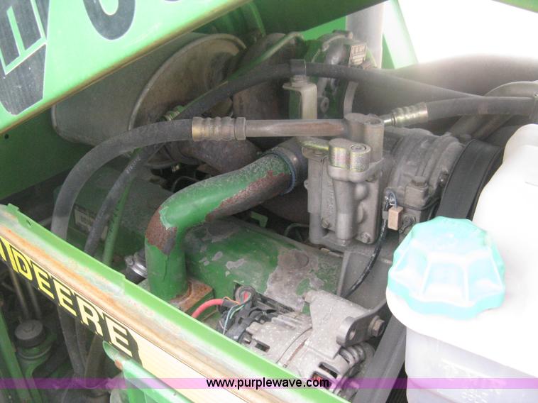 image for item D8490 2002 John Deere 6405 MFWD tractor