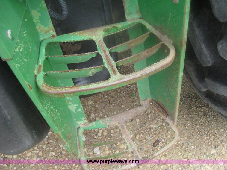 image for item D8490 2002 John Deere 6405 MFWD tractor