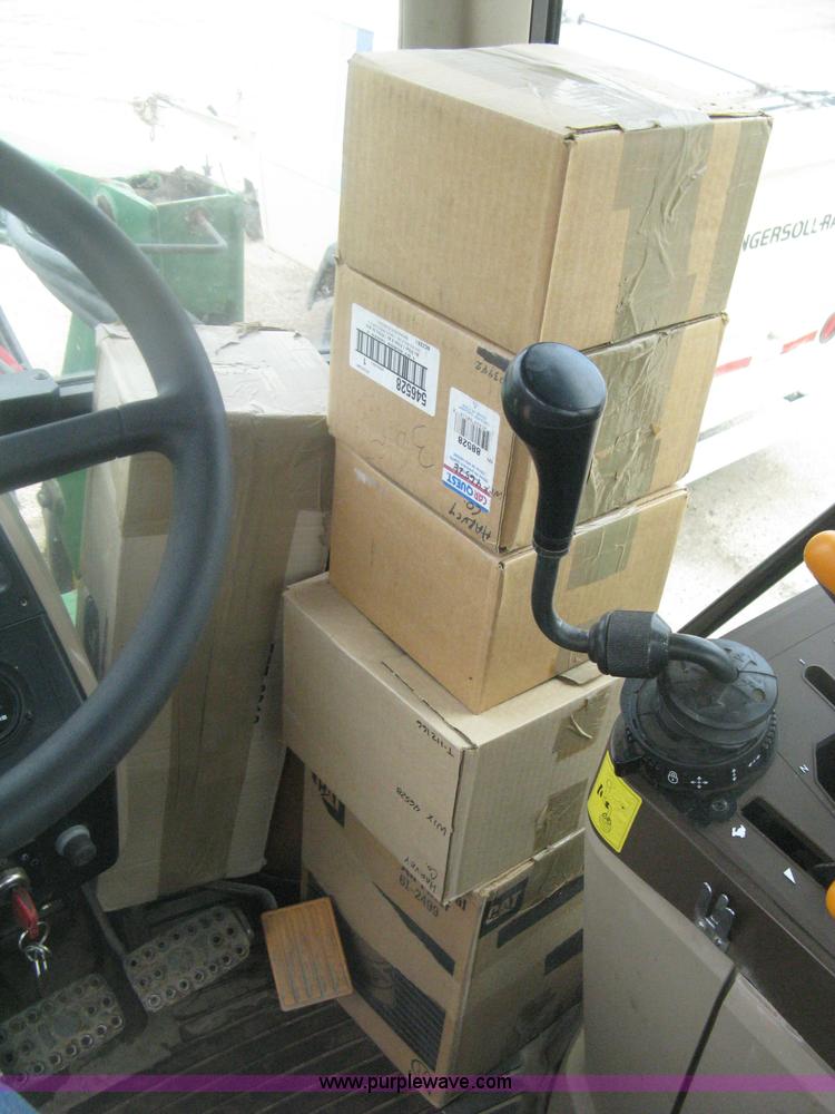 image for item D8490 2002 John Deere 6405 MFWD tractor