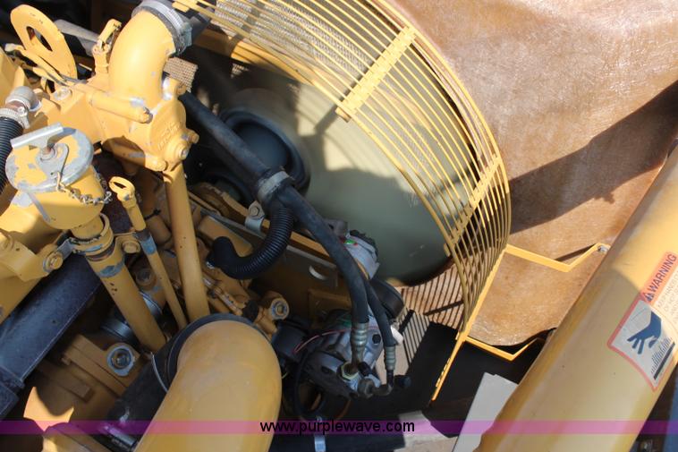 image for item H6537 1999 Caterpillar Lexion 480 RWA combine