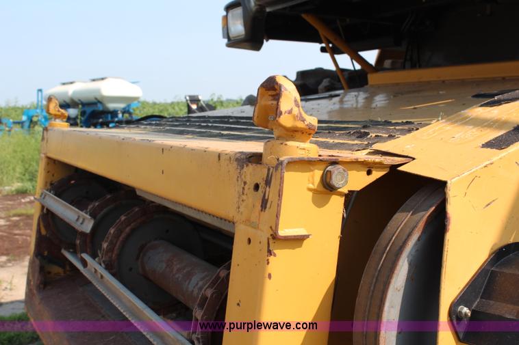 image for item H6537 1999 Caterpillar Lexion 480 RWA combine